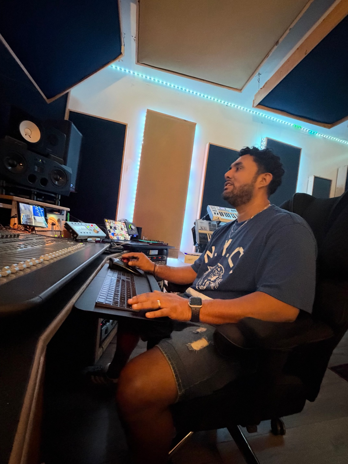 Chokobeats producer working at the mixing console